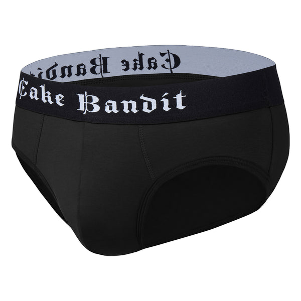 Black men's packing underwear with 'Cake Bandit' waistband on a white background