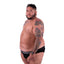 Side view of large trans man wearing Cake Bandit Packing Briefs