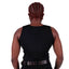 Black nonbinary person back view with red braids and a wide chest back view.
