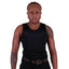 A person wearing a black long tank maximum compression chest binder with thin shoulder straps and a soft cotton front inner layer.