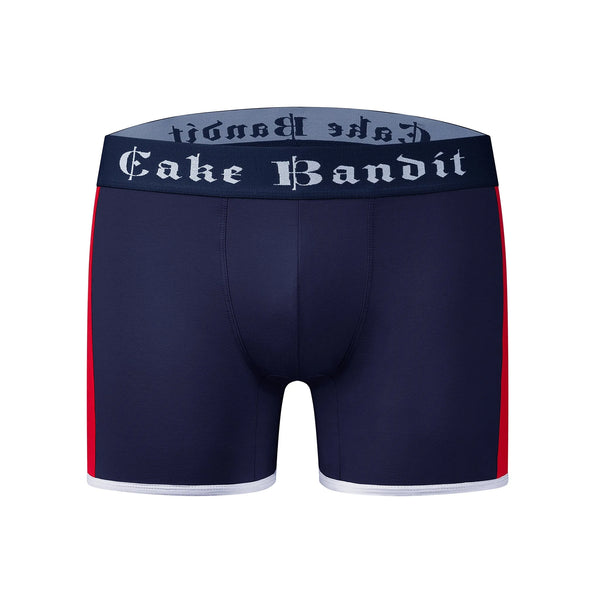 Navy blue boxer briefs with red and white stripes on each side. 'Cake Bandit' waistband on a white background