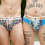 Two trans guys wearing the cake bandit swim briefs