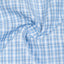Second date blue plaid long sleeve button up shirt close up of plaid fabric