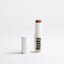 A Hunky Body Contouring / cover upStick in a medium brown shade.