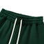 close up of green Hunky heavyweight long sweat shorts drawstring detail