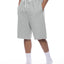 Long grey Hunky heavyweight shorts with raw hems side view on a person with their hands in the side pockets
