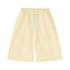 Butter cream colored Hunky Loose drawstring shorts with raw hems