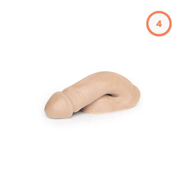 A medium-sized, flesh-colored elastomer packer with a realistic appearance, positioned against a white background.