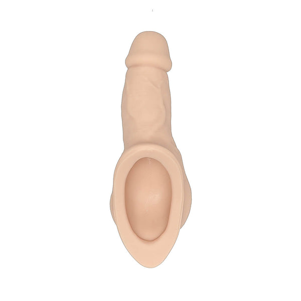 A stand-to-pee packer made of flesh-colored silicone, showing measurements of 4 inches in length and 3 inches in circumference.
