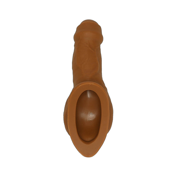 An image of a stand-to-pee device made of flesh-colored silicone, showing the device from multiple angles with dimensions marked.