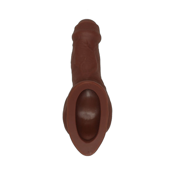 An image of a stand-to-pee device made of flesh-colored silicone, showing the device from multiple angles with dimensions marked.