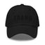 Black cap with black 'TRANS' embroidered text on a white background