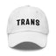 white dad hat with black embridered 'TRANS' text